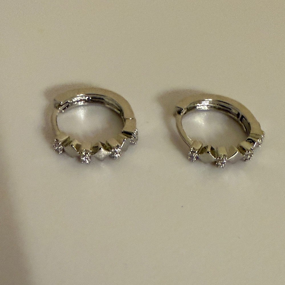 Elegant Silver Cut-Out Cubic Zirconia women’s Hoop Earrings